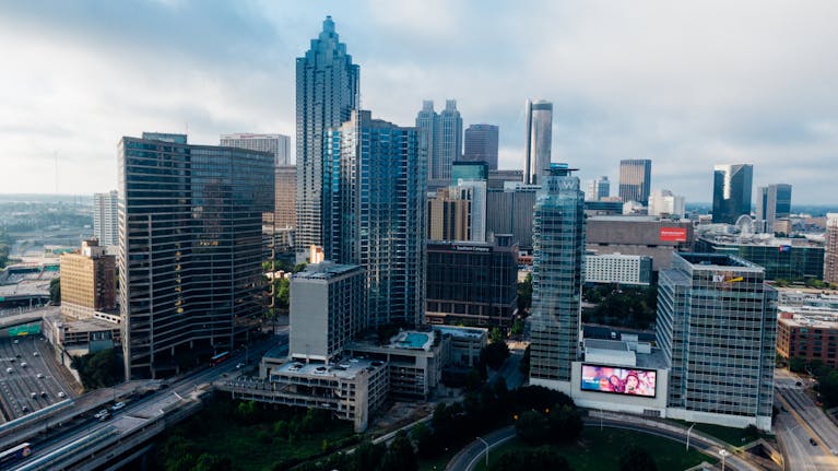 Aerial view of Atlanta's downtown skyline with modern skyscrapers during daytime.