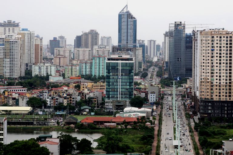 Aerial view of Hanoi showcasing modern skyscrapers and bustling city life.