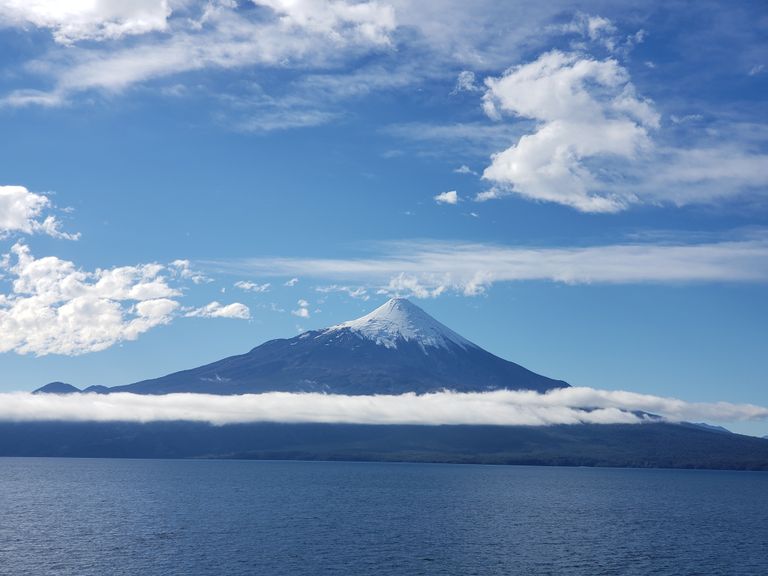 Scenic view of Osorno Volcano with a clear blue sky in Puerto Varas, Chile.